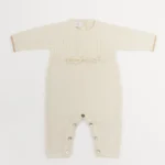 MILANO 100% kašmyro romperis kūdikiui – tyras baltas švelnumas, kuris užburia nuo pirmo prisilietimo